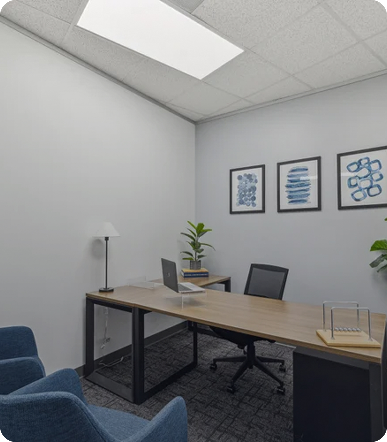 Private office with desk and window in Verve Workspace The Woodlands